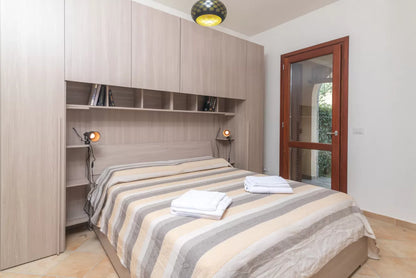 [ "CASA SMERALDA" // SAN TEODORO" ]