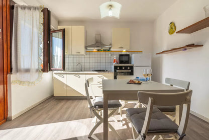 [ "LUNGOMARE SCOGLIO LUNGO APARTMENT" // PORTO TORRSE ]