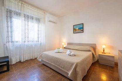 [ "LUNGOMARE SCOGLIO LUNGO APARTMENT" // PORTO TORRSE ]