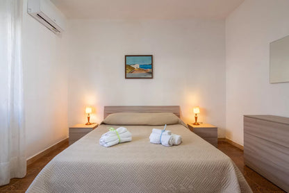 [ "LUNGOMARE SCOGLIO LUNGO APARTMENT" // PORTO TORRSE ]