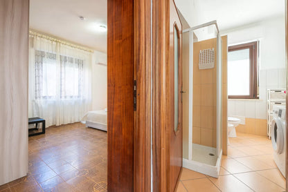 [ "LUNGOMARE SCOGLIO LUNGO APARTMENT" // PORTO TORRSE ]