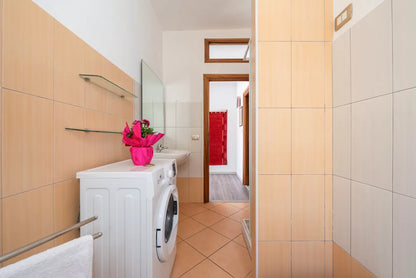 [ "LUNGOMARE SCOGLIO LUNGO APARTMENT" // PORTO TORRSE ]