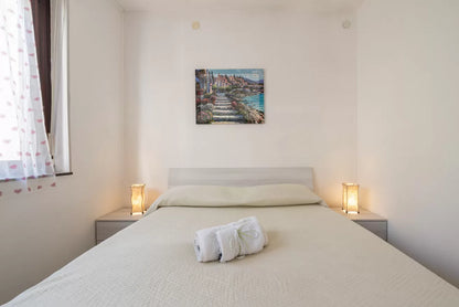[ "LUNGOMARE SCOGLIO LUNGO APARTMENT" // PORTO TORRSE ]