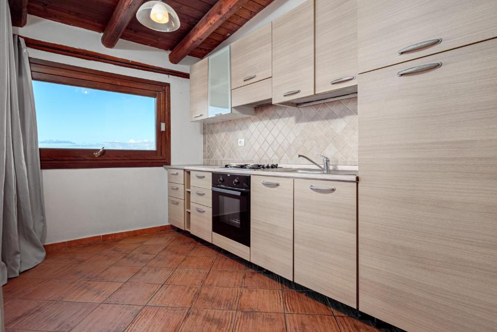 [ "TRILOCALE VISTA BLU" // GOLFO ARANCI ]