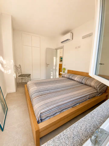 [ "BILOCALE PANTELLERIA GARDEN CON PATIO" // CANNIGIONE ]