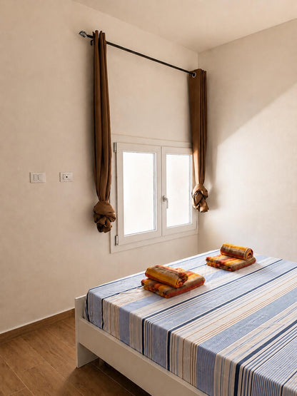 [ "APARTMENT SUNSET" // GOLFO ARANCI ]