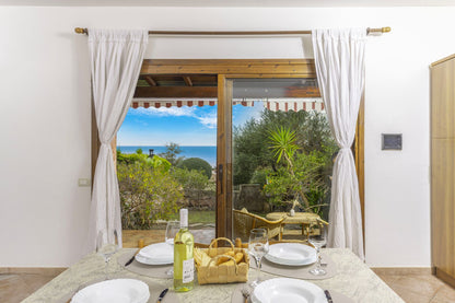 [ "CALA PORTO CORALLO" // VILLA PUTZU ]